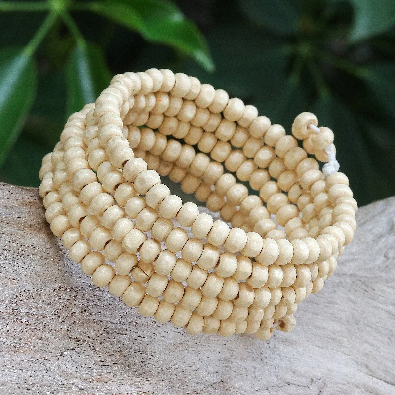 Stippled band bracelet-Novica Handmade Ivory Spin Wood Beaded Wrap Bracelet (1 In)