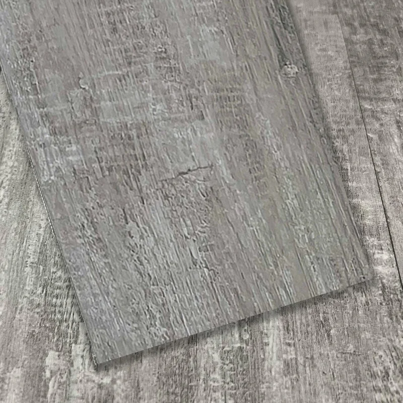 Rounded stone ring-Dundee Deco 6" x 36" Peel and Stick Vinyl Flooring Planks in Spanish Grey