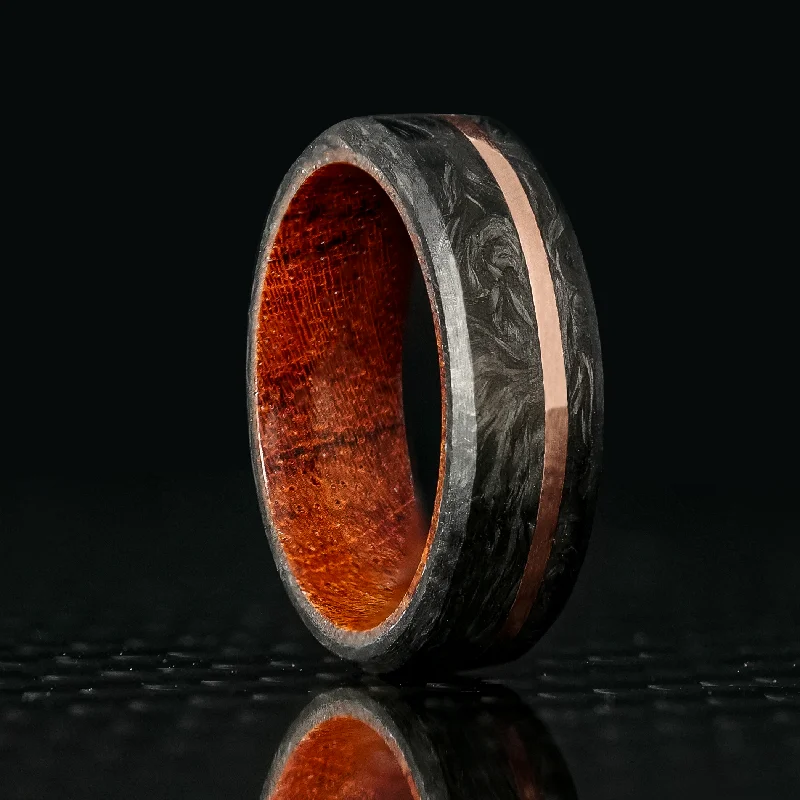 Clean cut ring-Forged Carbon Fiber and Gold Ring with Koa Wood Liner