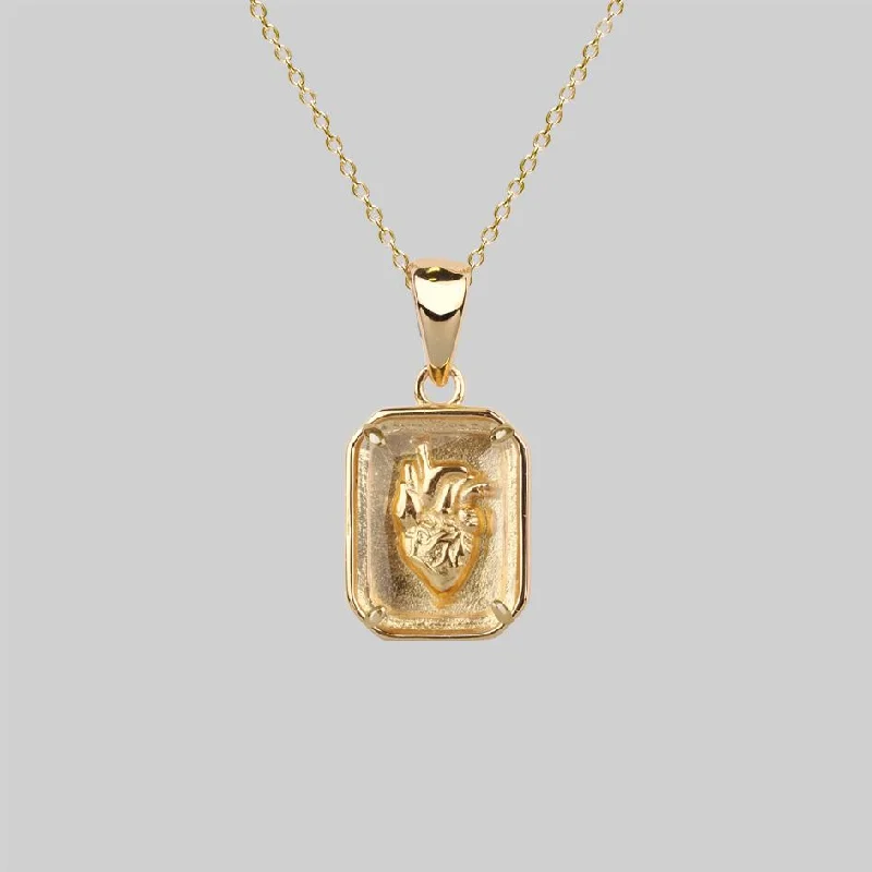 Slack coil necklace-HEART KEEPER. Anatomical Heart Under Glass Necklace - Gold